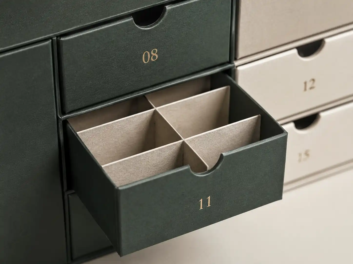 Macro detail of drawer advent calendar box compartments with paperboard dividers for B2B structure planning