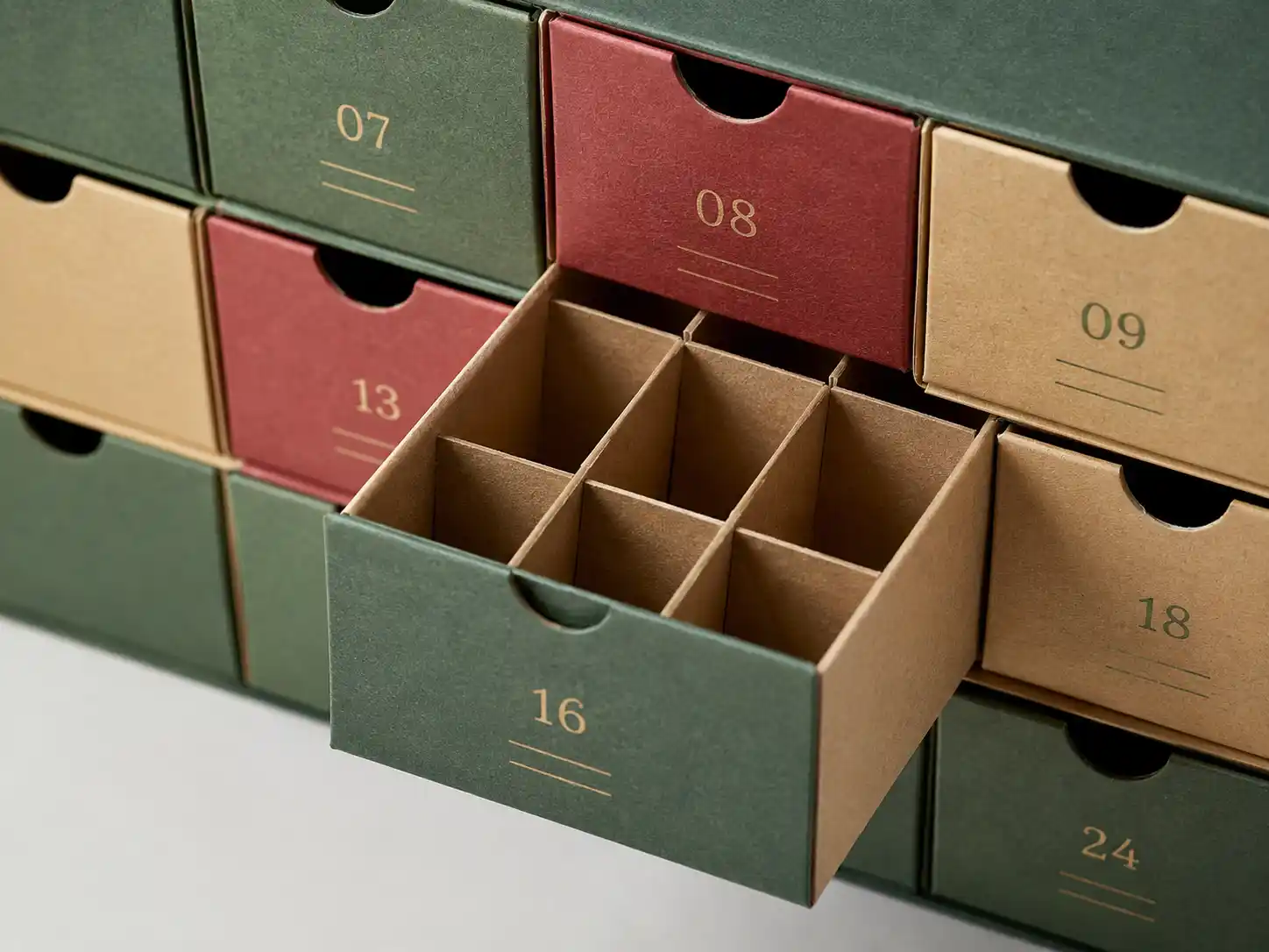 Macro detail of drawer compartments and paperboard dividers for sustainable advent calendar box materials