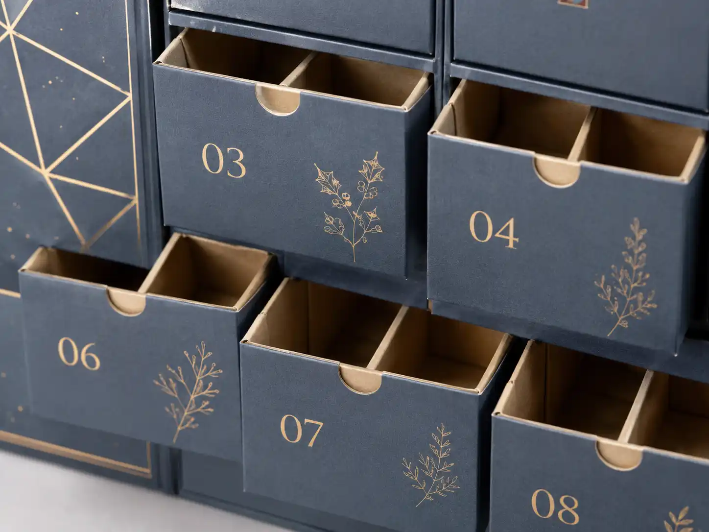 Macro detail of drawer compartments and paperboard dividers for custom advent calendar boxes