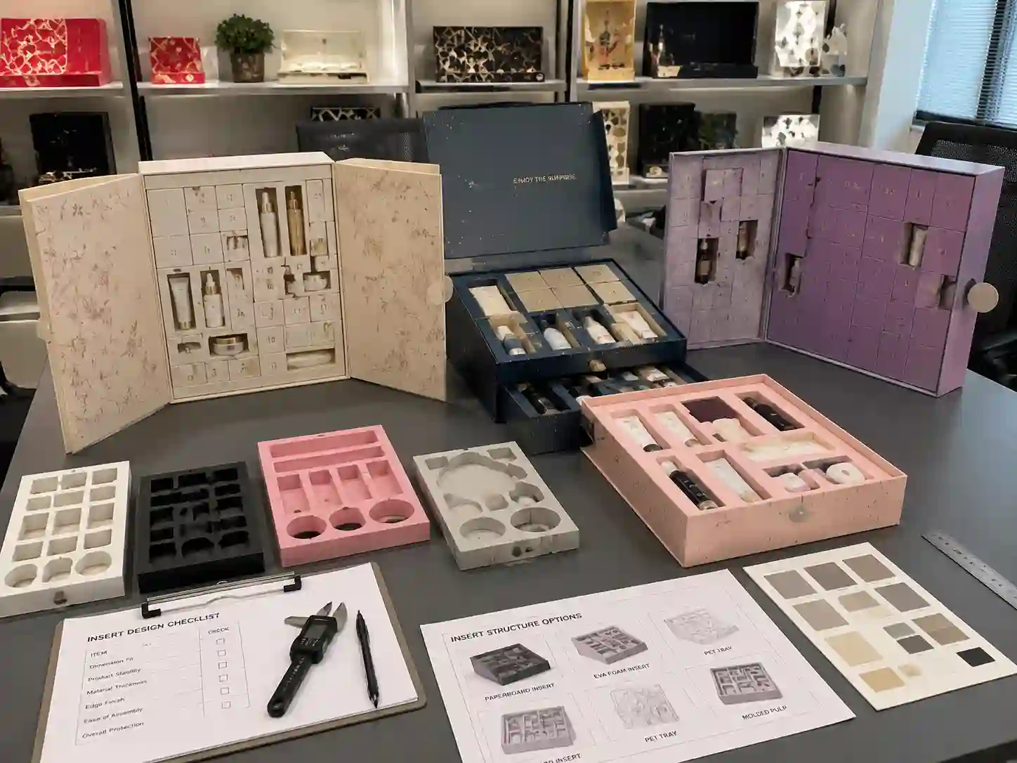 Beauty gift set advent calendar box prototypes showing different insert design options for cosmetic packaging buyers