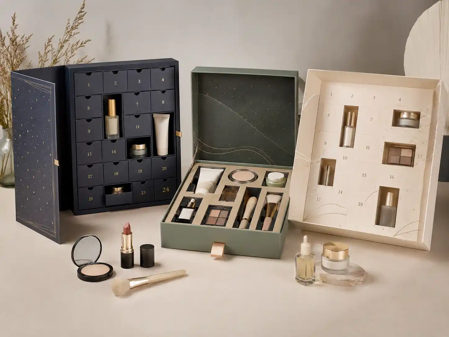 Finished beauty gift set advent calendar boxes showing rigid, drawer, and folding carton structures with fitted cosmetic inserts