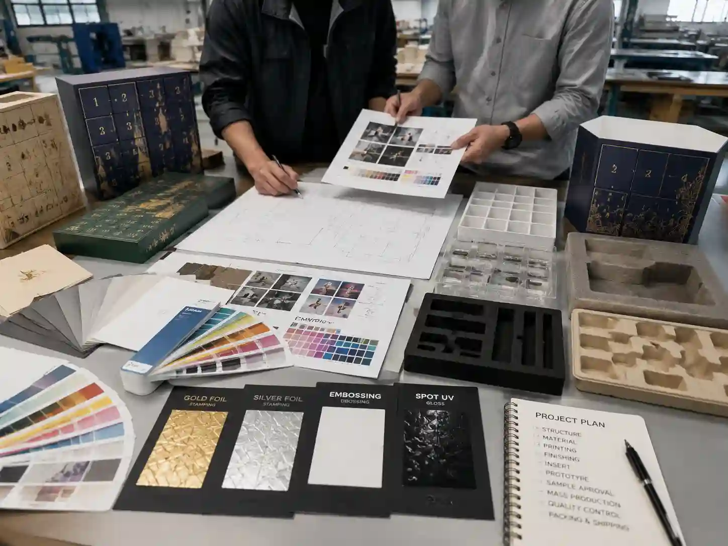 Packaging engineers reviewing premium advent calendar box artwork, materials, and prototype samples
