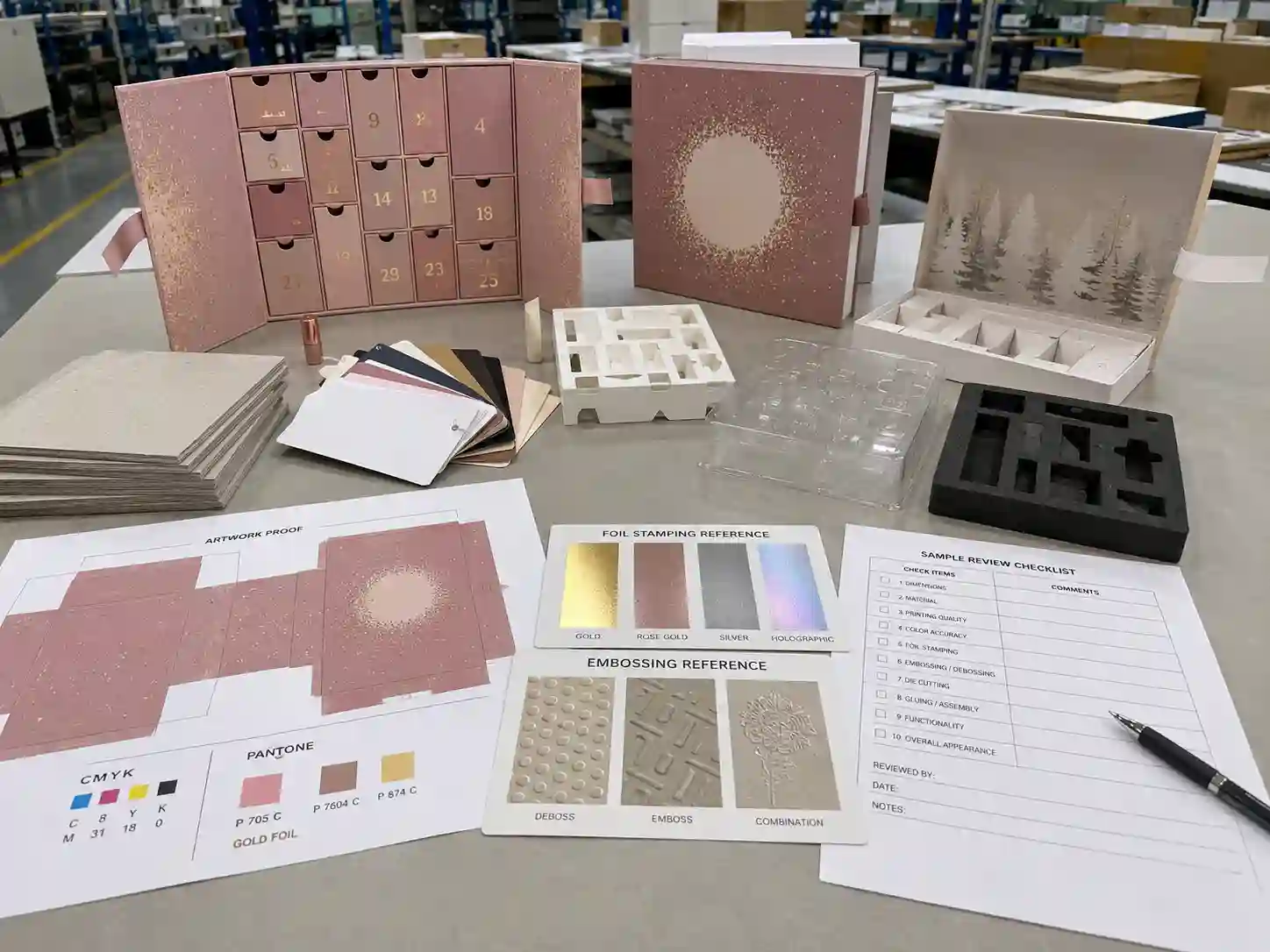 Factory planning table for makeup advent calendar box dielines, material swatches, insert samples, and artwork proof review